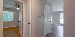 RENOVATED 2/1 w/ New Flooring/Paint, Fenced Yard, Deck, Walk In Closets, Granite Counters, & Stainless Appliances ! Avail NOW for $1295/month Gallery 16