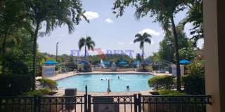 4 BR / 3 FULL BATH (INCLUDES 2 MASTERS) 2 STORY (NEAR DISNEY!) GATED COMMUNITY WITH COMMUNITY POOL!** Gallery 1