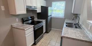 Single Level 2 bedroom 2 full bath brick townhome in Garner $1395/mo. Gallery 1