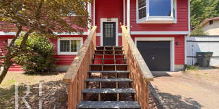 Freshly Painted East Bremerton Home with Expansive Decks & Flexible Living Space Gallery 1