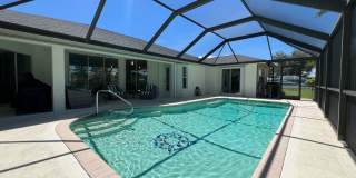 FURNISHED SHORT TERM RENTAL - 3 Bed / 2 Bath - Single Family Pool Home - $5,000/month ** Heated Swimming Pool **Canal View Gallery 3