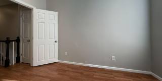 Charming 4BR/2BA Rowhouse with Hardwood-Style Flooring Throughout Gallery 7