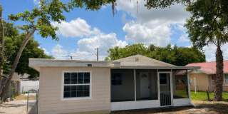 Great Location for This 4BR/1BA Lakeland Home! Large Screened In Porch, Fenced Backyard Gallery 1