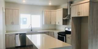 Beautiful construction townhouse with quartz countertops and 2 car garage Gallery 1