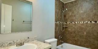 Spacious 2-story 2 BR/1.5BA Avalon Condo Near Airport Gallery 1