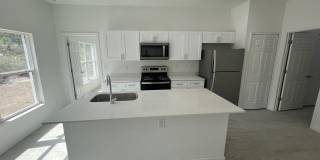 MODERN BRAND NEW 4BD/2BA RETREAT IN LEHIGH ACRES! Gallery 15