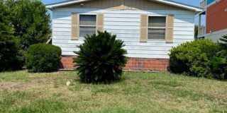 Introducing a charming 3-bedroom, 2-bathroom house located in the desirable Carolina Beach, NC. Gallery 1