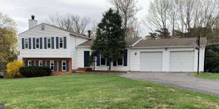 Lovely 4 bedroom, split level home with updated kitchen appliances and floors. Gallery 1