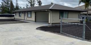 Move-In Ready 3-Bed, 2-Bath Home in Ainaloa – AC, Garage  Wi-Fi Included Gallery 1