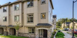 16050 NW Frog Lane ~ MOVE IN SPECIAL! 1st Month's Rent FREE! Striking Bethany Townhome! Gallery 1