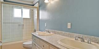 Stunning two-story spacious home on tranquil tree-lined street. Gallery 44