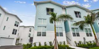 A charming coastal townhouse, just minutes from downtown St. Pete! Gallery 1