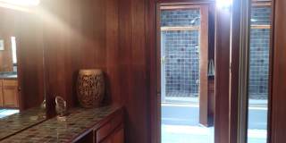 Very private, mostly furnished, rustic Maui Meadows home with large pool, walk around deck with panoramic ocean views. Available for 6 months only. Gallery 26