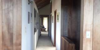 Very private, mostly furnished, rustic Maui Meadows home with large pool, walk around deck with panoramic ocean views. Available for 6 months only. Gallery 30