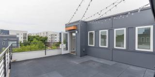 Stunning South End end unit townhome in the modern and amazing Southpoint community. Gallery 41