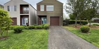 Charming 3 Bedroom, 2.5 Bathroom Home with Large Living Room, Tall Windows, Island Kitchen, and Attached Garage Gallery 1