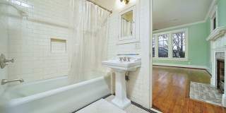 Stunning Tudor-style 4BR/3.5BA home in a prime, unbeatable location! Gallery 29