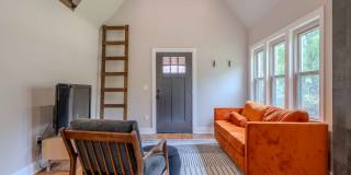 Completely remodeled like new Gingerbread midtown cottage with gleaming hardwoods, converted from a 3/1 to a 3/2. Gallery 8