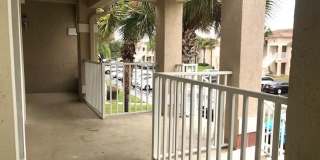 Nice 2X2 located on 2nd floor- Tile & laminate flooring! NO CARPET! Call today!! Tranquil water view from screened in back balcony!!Laundry closet with washer and dryer!! Gallery 4