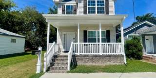 Turn-Key Modern Gem: 4 Bed/3 Bath, Open Layout & Private Backyard Deck Gallery 1