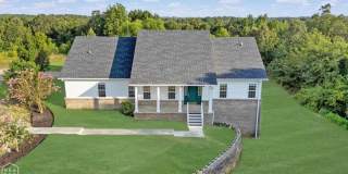 Spacious 5-Bedroom Home on 1.5+ Acres in West Side School District Gallery 1