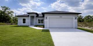 MODERN BRAND NEW 4BD/2BA RETREAT IN LEHIGH ACRES! Gallery 1