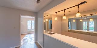 Scenic Brook West Sanctuary: Well-Maintained Home with Expansive Backyard Gallery 7