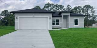 JUST BUILT! Move-In Ready 4 Bed / 2 Bath / 2 Car Garage in Lehigh Acres Gallery 1