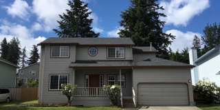 $500 OFF First 2 Months – Spacious 4BR/3BA Home with Fenced Yard  2-Car Garage in Tigard! Gallery 1