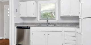 Discover the charm of this brick ranch nestled in the heart of Madison Park Gallery 14