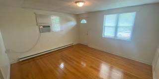 Private carport, in-unit laundry, and the Lakewood strip right outside your door. Gallery 13