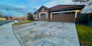 Open Kitchen, Expansive Living, and Covered Patio in Tranquil South Reno Near Trails, Parks & Shopping Gallery 3