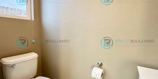 Open Kitchen, Expansive Living, and Covered Patio in Tranquil South Reno Near Trails, Parks & Shopping Gallery 42