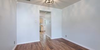 Modern Elegance: 3-Bedroom Townhome with Wood Flooring, Shaded Deck, and Inclusive Amenities Gallery 9