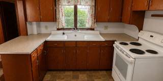 Spacious 4-Bedroom Home with Garage, Fenced Yard & Historic Character | Rochester, NH Gallery 4