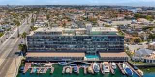 Spacious 2 Bedroom 2 Baths Condo with Water Views, Pool, and Parking! Gallery 1