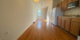 A charming two bedroom one and one half  bath row house located just off New Jersey Ave in the Shaw Neighborhood! Gallery 4