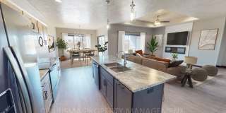 WALK IN AND AMENITY FILLED THREE BEDROOM TOWNHOME! Gallery 1