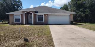 Affordable 4-Bedroom Gem in Poinciana – Prime Location Near Parks  Playgrounds! Gallery 1