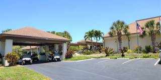 Bird Bay Village Annual Rental – Furnished 1st Floor Unit with Covered Parking Gallery 3