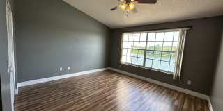 Beautiful Townhome in a gated community with assigned parking spots and a community pool Gallery 13
