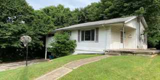 Three Bedroom 1.5 Bath Home with Drive Under Garage! Three Bedroom 1.5 Bath Home with Drive Under Garage! Gallery 1