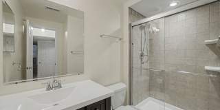 Spacious 2BR/2BA Corner Unit with Finished Basement, Private Patio & Garage Gallery 17