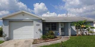 BEAUTIFUL 2/2/1 1000 Sq. Ft. with a large open floorplan, fenced yard and an enclosed lanai!! Gallery 1