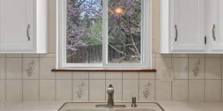 4BR/4BA Updated Home with Finished Basement Suite & Landscaped Yard Gallery 10