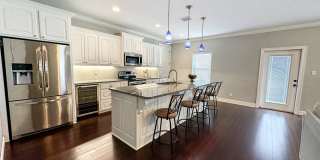 Furnished and utilities included! 1 bedroom garage apartment in *Stonewall* gated neighborhood! Gallery 1