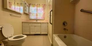Bi-Level House w/ Massive Backyard, Storage, & Character! Gallery 12