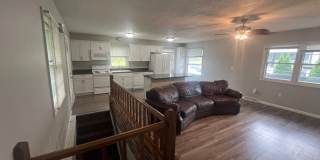 West Side Iowa City Home Near UIHC & Kinnick |  Large Deck, Private Yard & Parking Gallery 1
