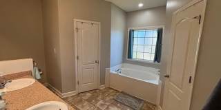 Spacious 4BR Home with Fireplace, Screened Porch & Privacy-Fenced Yard Gallery 13