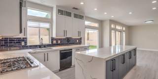 Luxury 5-Bedroom Home in Guard-Gated Community with 3-Car Garage Gallery 9